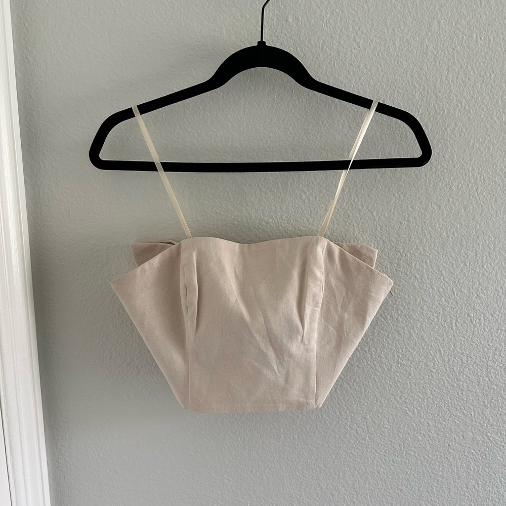 Hutch top. Elegant Cream Women's Top with bow on back